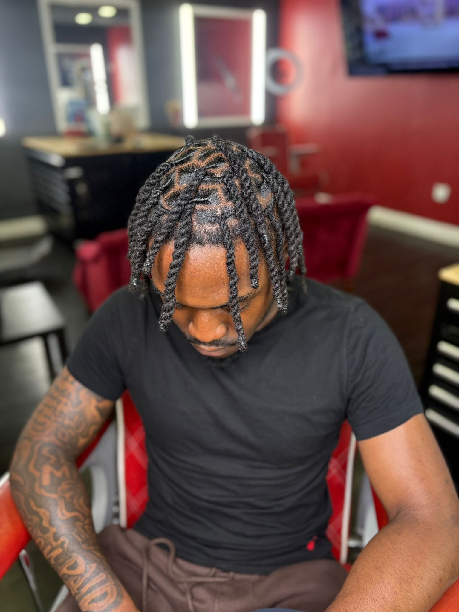 Fresh locs styled by Luxury Locs by Ive
